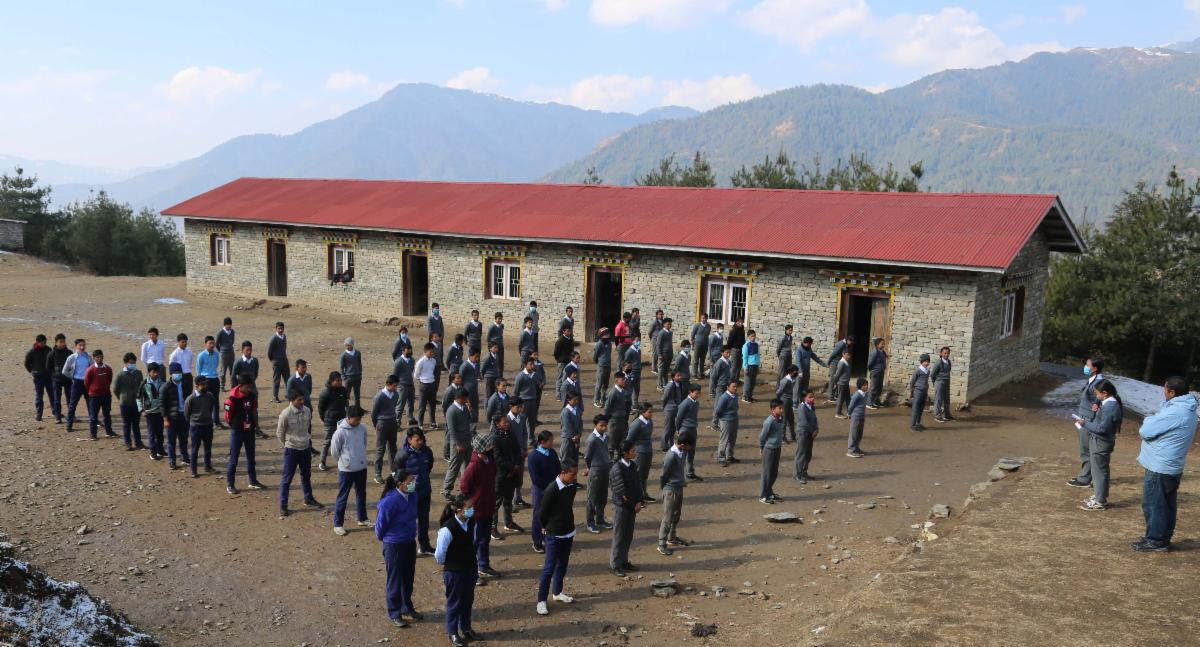 School captains Pratik Shrestha and Sumina Rai from Class 9 conduct morning assembly